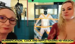 A SUB MUMMIFIED ON A PILLORY IS GETTING EXCITED BY COCK AND NIPPLES TEASING ENGLISH HD VERSION