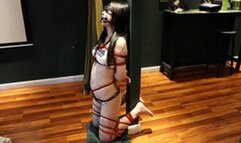 The barefoot girl in her restrictive underwear vibrated until she reached orgasm.