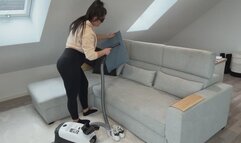 Miss Cookie vacuums her Couch