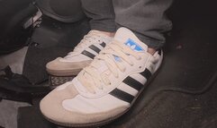 Amelie drives back from the gas stain wearing her Adidas Samba sneakers