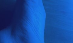 Left Foot Under Colored Lights