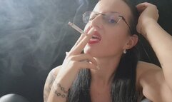 I smoke a cigarette using my front teeth to put it out as an ashtray