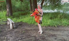 Alla deflates a rare inflatable toy on the lake shore