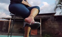 Cute high heels dangling from a mature woman's feet (1)