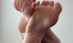 SOLEMN (feet on the table)