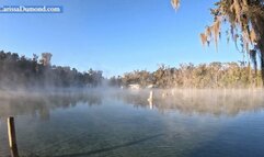 Carissa in the pink and white wet suit in the springs