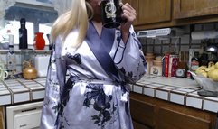 Housewife masturbating on a kitchen counter