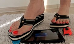 Trampling Nintendo Switch in Striped Sandals