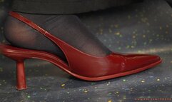 Amazing nylon feet with sexy red high heel pointed sandals, foot fetish ignoring and admiration close-up.