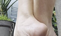 Milah scratching her beautiful highly arched feet in flip flops for your viewing pleasure