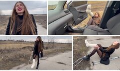 Nastya is walking on crutches with a broken leg in a cast