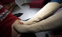 Ball stomping with cow boy boots, hard soles make to crush and squeeze.