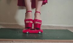 Giantess Lily Kink toy car crush of a 67 Chevelle SS in big mega red heels and stomping the bits in a box close ground view