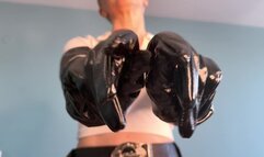 Blonde goddess enjoys her shiny gloves and real leather pants