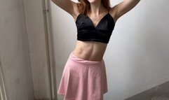 Girl in nylon tights He steps on the fruit with his feet, Her toes are covered with fruit juice