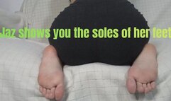 Jaz shows you the soles of her feet