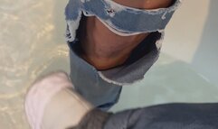 Mom jeans, grey shirt, white jacket with white sneakers.