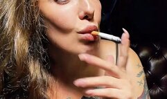 Smoking in shorts and a sports bra, no makeup – Newport Menthol