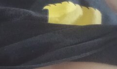 A hot woman smoking and showing off her big, juicy breasts.