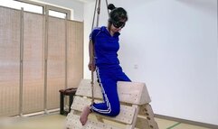 HH112-An Asian schoolgirl in a uniform sits on a rocking horse, eventually being suspended with a vibrator strapped to her buttocks, causing her to experience a vibrating orgasm.