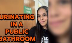 Urinating in a public bathroom