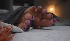 Deep purple toes and wrinkled soles