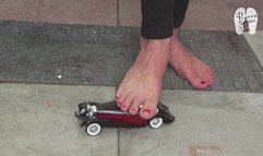 Model Car under naked feet