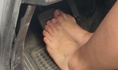 Bbw with big feet barefoot pressing car pedals and peeling off brake pad cover with toes