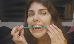 Teeth fetish: bitting a pencil