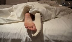 Ignoring You Listening Music - Sock Off Bare Feet Under Blanket Tease