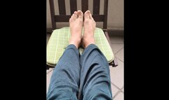 I am putting my bare feet on the chair so you can see them up close