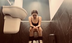 Pissing in a public toilet