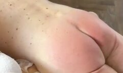 An OTK strapping and slippering