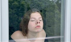 Lisa slides her face against the glass, cute piggy nose (custom video)