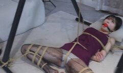 bt12-A girl wearing a gag was disciplined by a rope bondage artist.