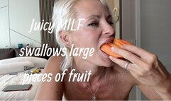 Juicy MILF swallows large pieces of fruit