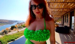 Busty redhead MILF Red XXX gets off poolside