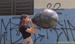 Katie Blows to Pop a Black SR 16"