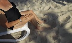 Fan watches Tempest play in sand