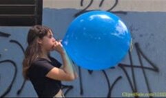 Katie Blows to Pop a Blue 16" Punchball