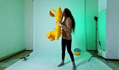 Liya inflates toys with her mouth 2023