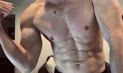 Devon flexing his muscles up close SD