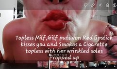 Topless Milf,Gilf puts von Red lipstick kisses you and Smokes a Cigarette topless with her wrinkled soles Propped up
