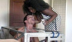 CAGED AND SPAT ON BY CRUEL MISTRESS