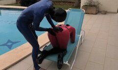 Cunnilingus for the rubber doll in a neck corset