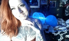Tattooed Girl Inflating a Mini-Pool and Beach Ball