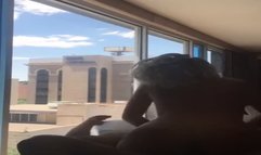 Hot interracial sex by the window