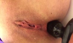 my wife playing on her iphone