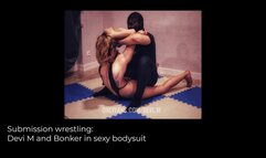 Submission wrestling: Devi M and Bonker in sexy bodysuit