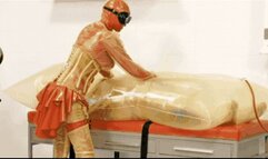 Fetish rubber couple in medical clinic - Part 1 of 2 - The inflatable cocoon